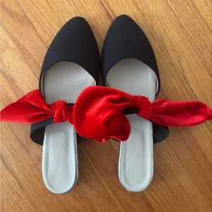 Stretch Your Life Black Flat Mules with Vibrant Red Bow 38
